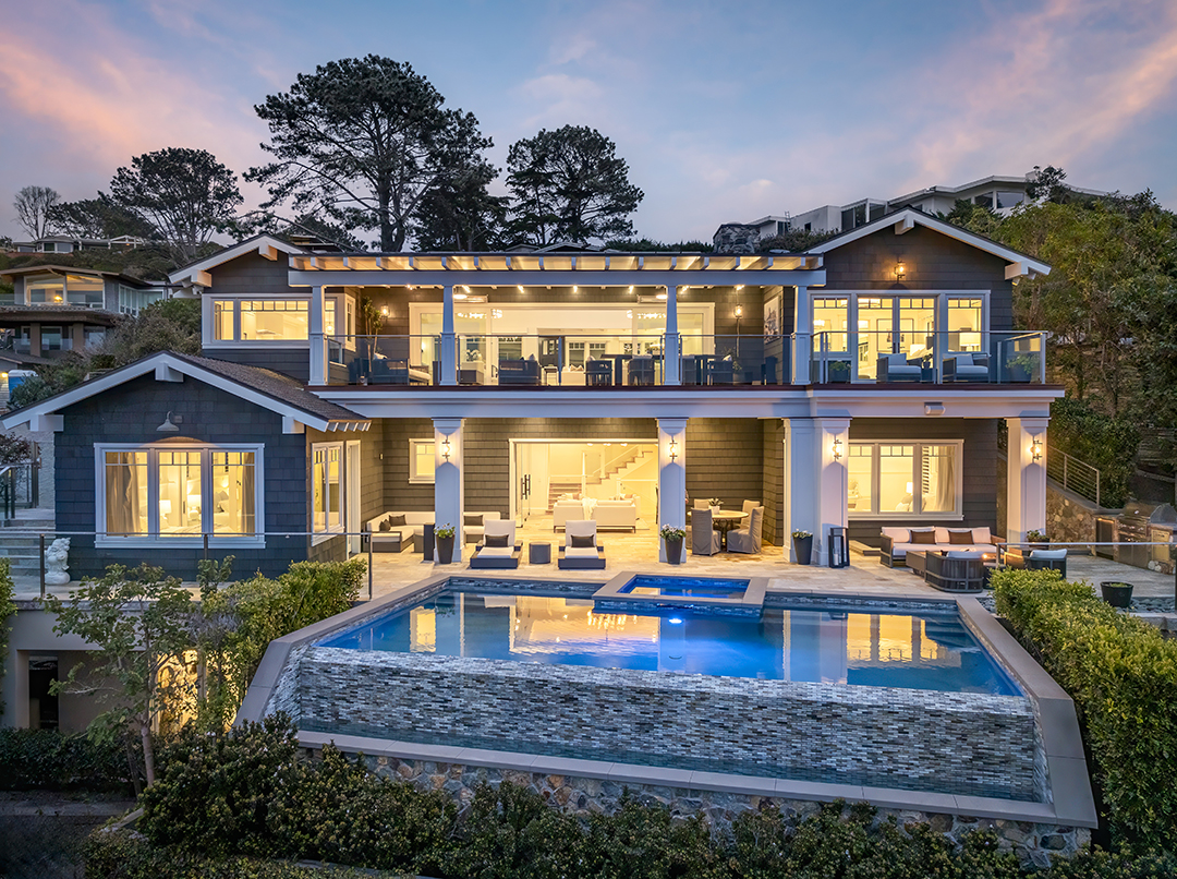 Bokal Sneed Architects has refined this Coastal Craftsman with an indoor-outdoor floor plan and a portfolio of high-quality finishes