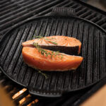 Raw salmon on the grill