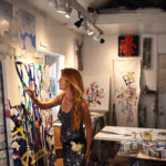 Robin Branham in her studio working on one of her pieces