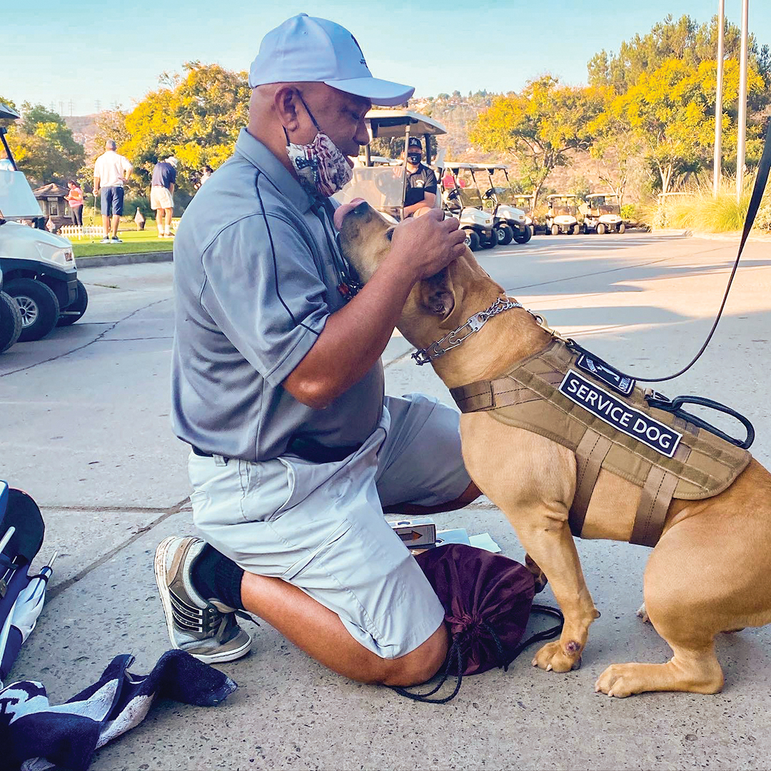 Lito Bautista, U.S. Navy (Ret.) with Shelter to Soldier service dog Halia