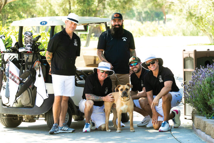 Gary Baker, Andrew Dale, Dustin Potash, Nigel the service dog, Blake Vanderwiel, and Jared Trombetta