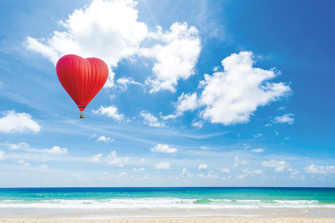 Beautiful Red balloon in the shape of a heart at Karon beach, Phuket, Thailand. Asia