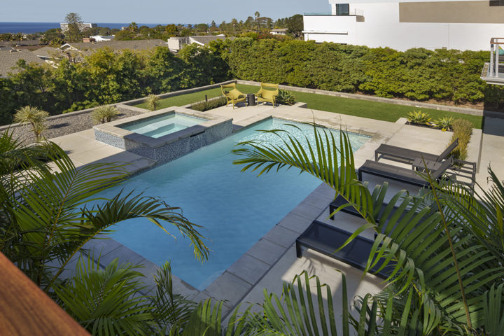 The terrace overlooks the pool and spa, and the ocean beyond