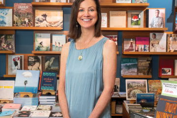 Portrait of Nancy Warwick in La Jolla's Warwick's bookstore