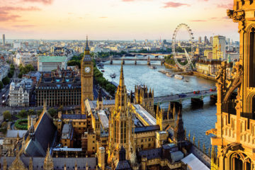 View from Victoria Tower of the Houses of Parliament, the River Thames, Westminster and Westminster Bridge, with the London Eye in the distance, London, England.