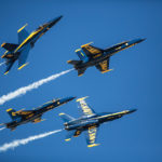 U.S. Navy Blue Angels perform a dramatic maneuver with their F/A-18 Hornets while flying in a precision aerobatic formation during the 2016 Marine Corps Air Station (MCAS) Miramar Air Show at MCAS Miramar, Calif., Sept. 24, 2016. This year’s air show is dedicated to recognizing 100 years of the Marine Corps Reserves. (U.S. Marine Corps photo by Lance Cpl. Ariana Castro/RELEASED)