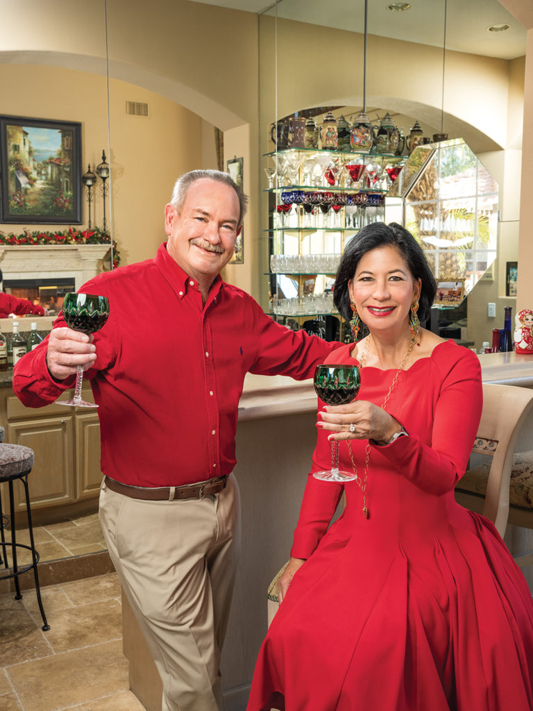 Cheers! Jon and Dee Ammon get into the holiday spirit at home in Alpine