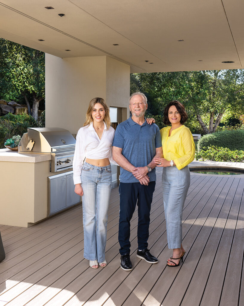 Barry and Natalie Moores with daughter Allison on the patio of their Rancho Santa Fe home