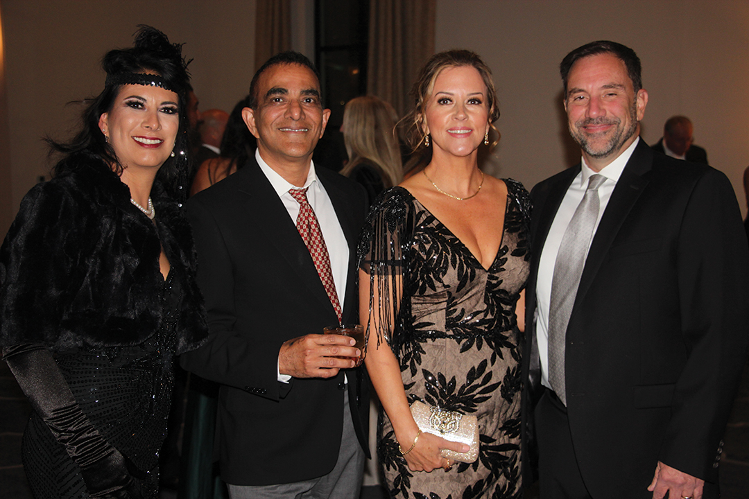 Michele Gonzales, Nayar Siddique, and Paola and Andres Zimmerman