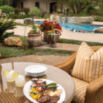 Hot off the grill, a lunch of carne asada, veggies, and margaritas is served. A swim often follows