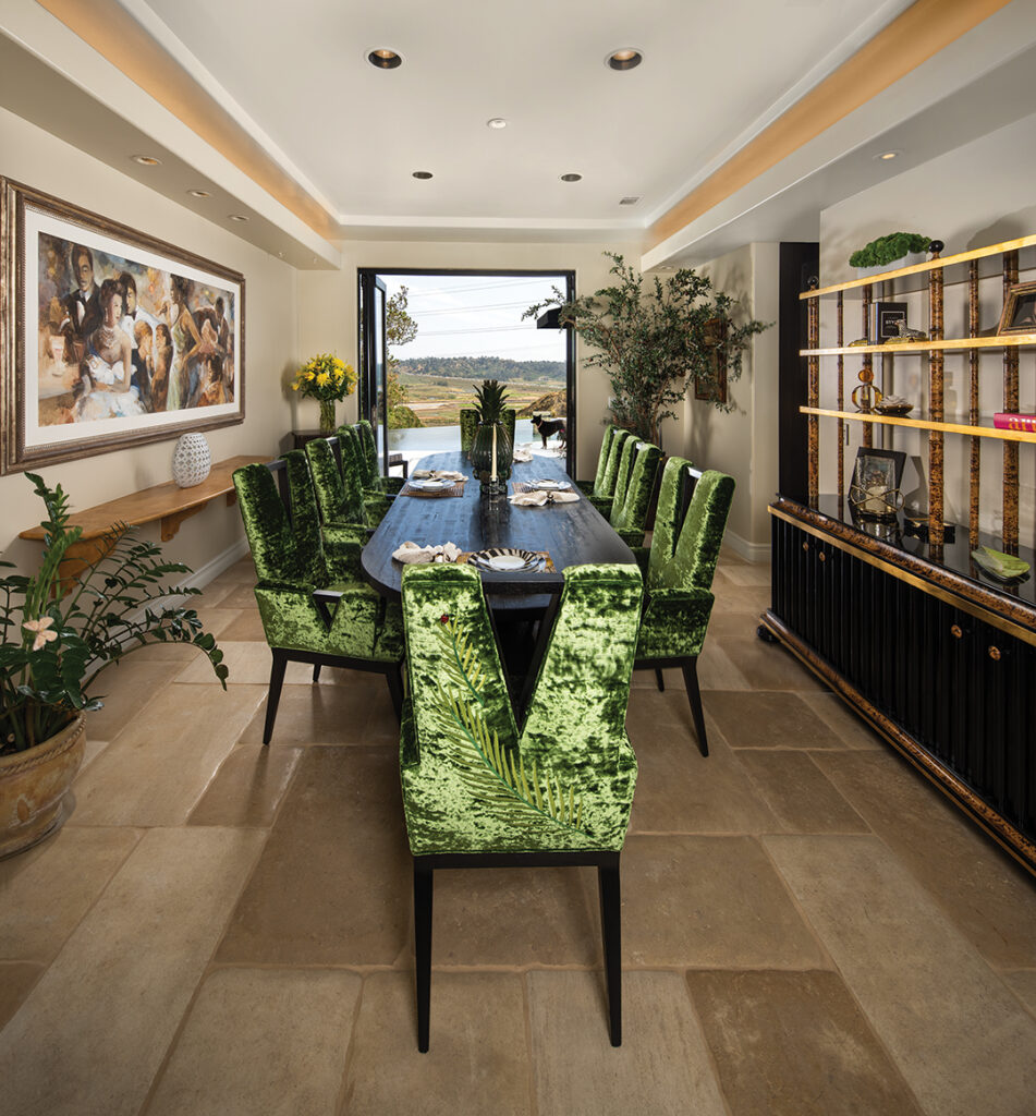 The dining room features furniture from Dragonette Limited in Palm Desert including custom velvet chairs