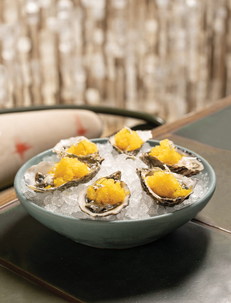 West Coast Oysters topped with passion fruit sangrita