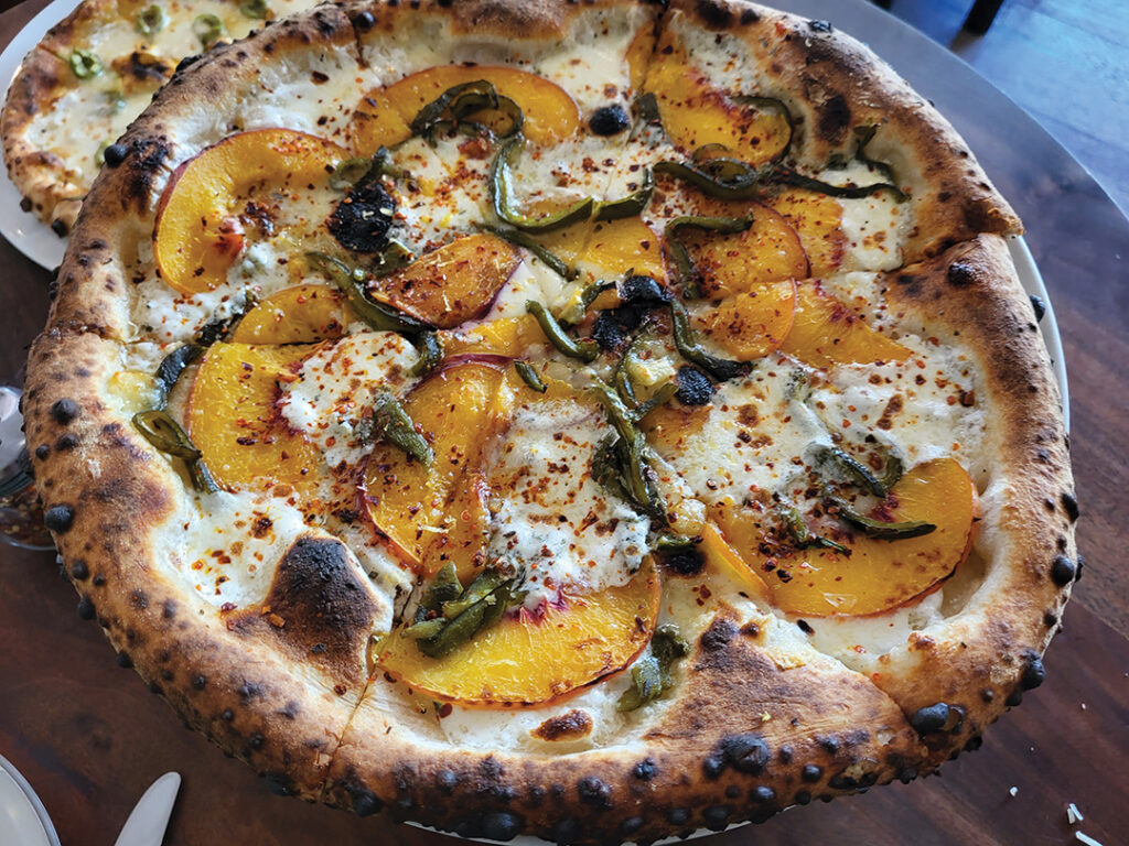 Peach-topped pizza at Bettina