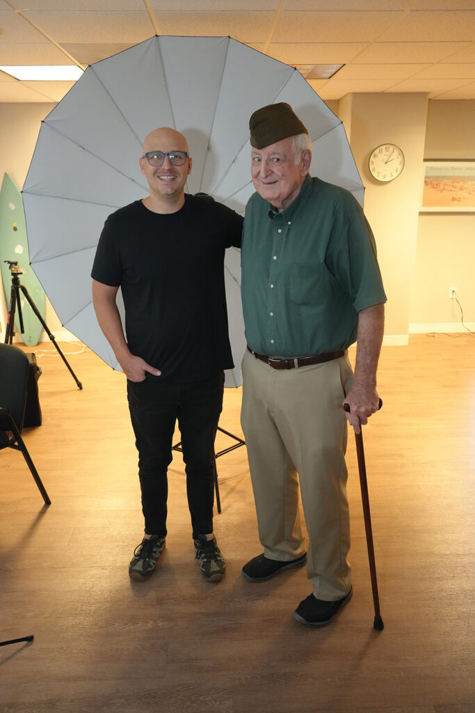 Photographer Tom Sanders with veteran and Belmont Village resident Malcolm MacDonald