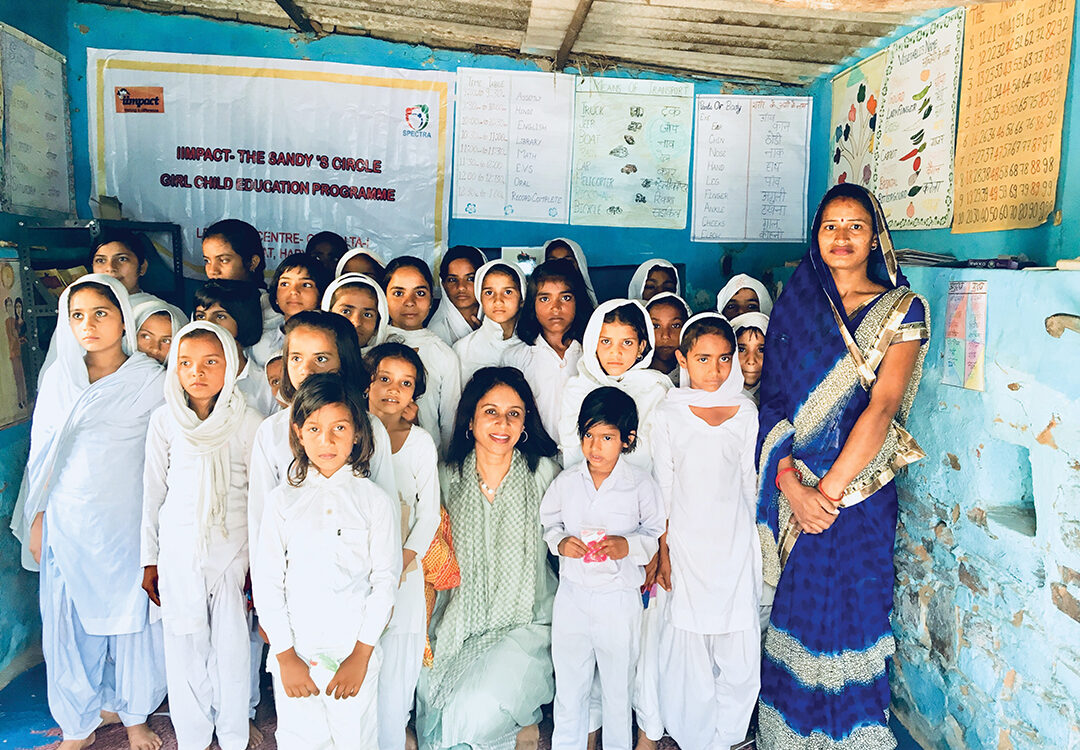 Sushma Patel (center) with students at Diegueño Daughters, an all-girls school in India created by funds raised by Rancho Santa Fe’s Diegueño Country School students