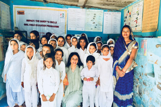 Sushma Patel (center) with students at Diegueño Daughters, an all-girls school in India created by funds raised by Rancho Santa Fe’s Diegueño Country School students