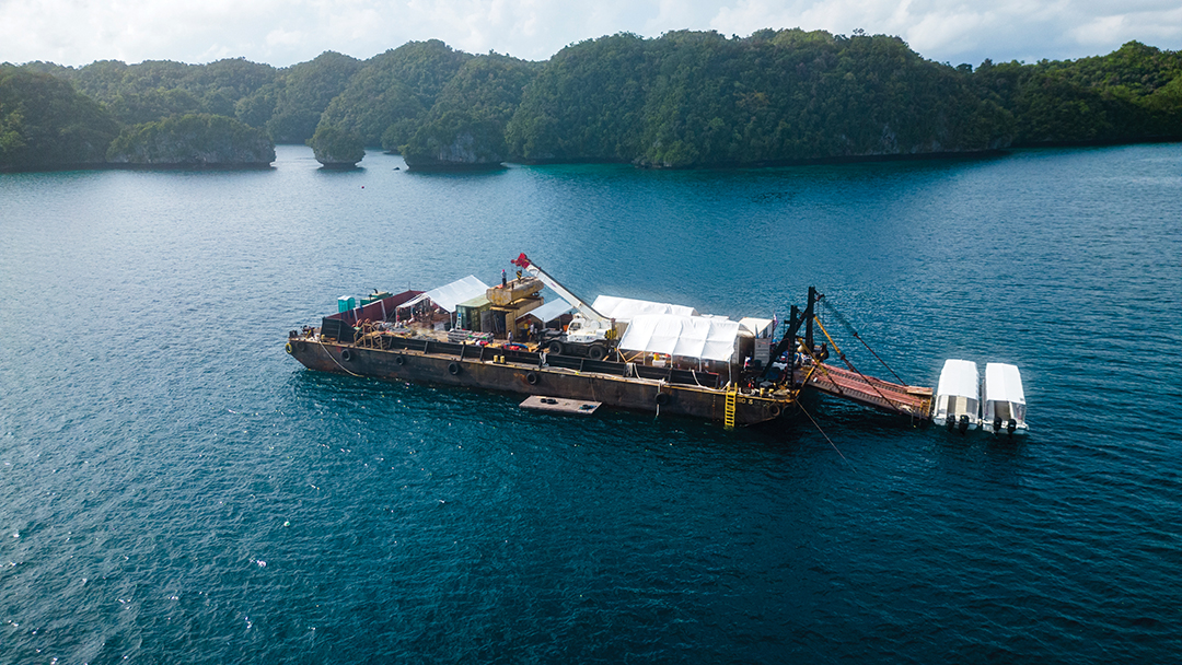 The barge Project Recover worked on sits over the top of an MIA-related crash site resting 120 feet below the surface of the ocean in Palau