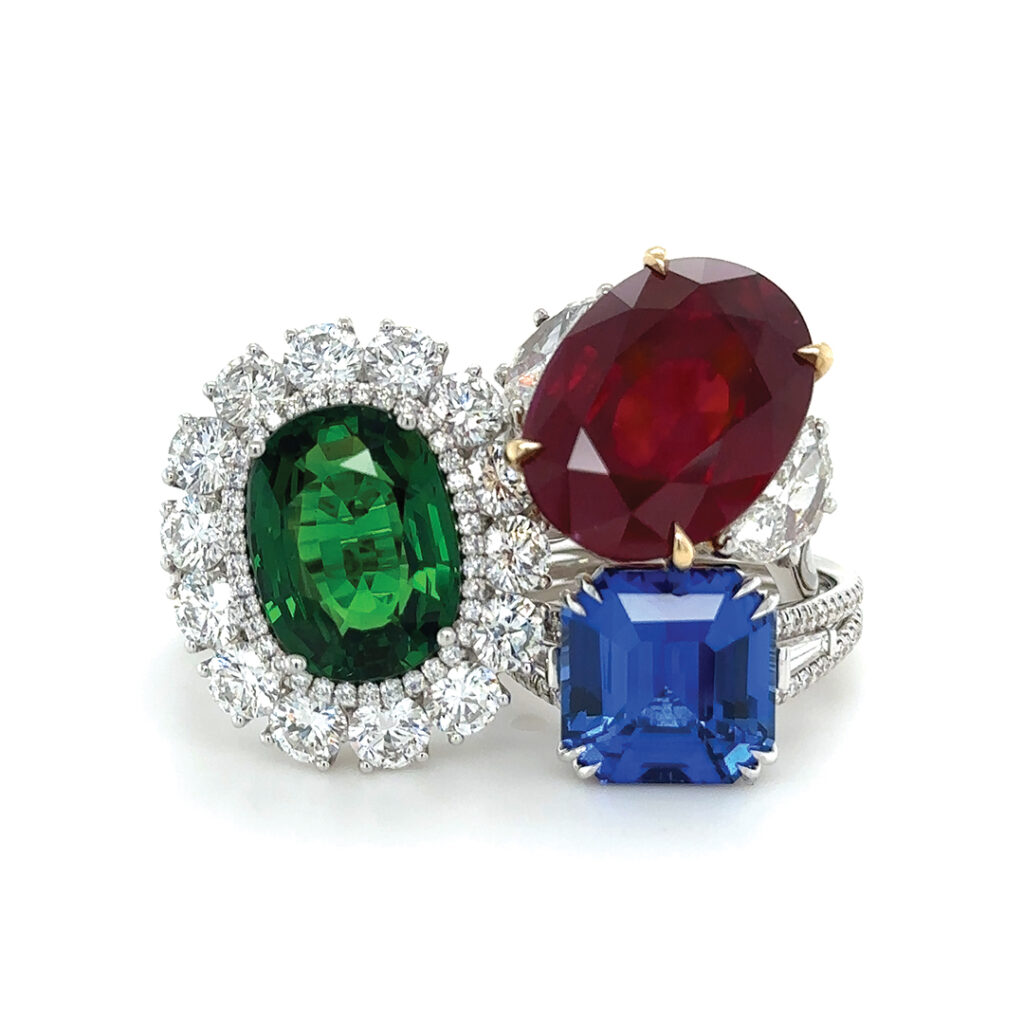This glittering trio from John Matty Co. 
in Rancho Santa Fe includes an Asscher cut sapphire-and-diamond ring, an oval Burman ruby-and-diamond ring, and an oval tsavorite-and-diamond ring