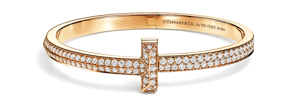 Leave it to Tiffany & Co.’s designers and artisans to transform radiant diamonds, glittering gemstones, and luminous metals into exquisite gifts to be treasured all year long. The Tiffany “T1” bangle is set with 315 round brilliant diamond in an intricate honeycomb pattern