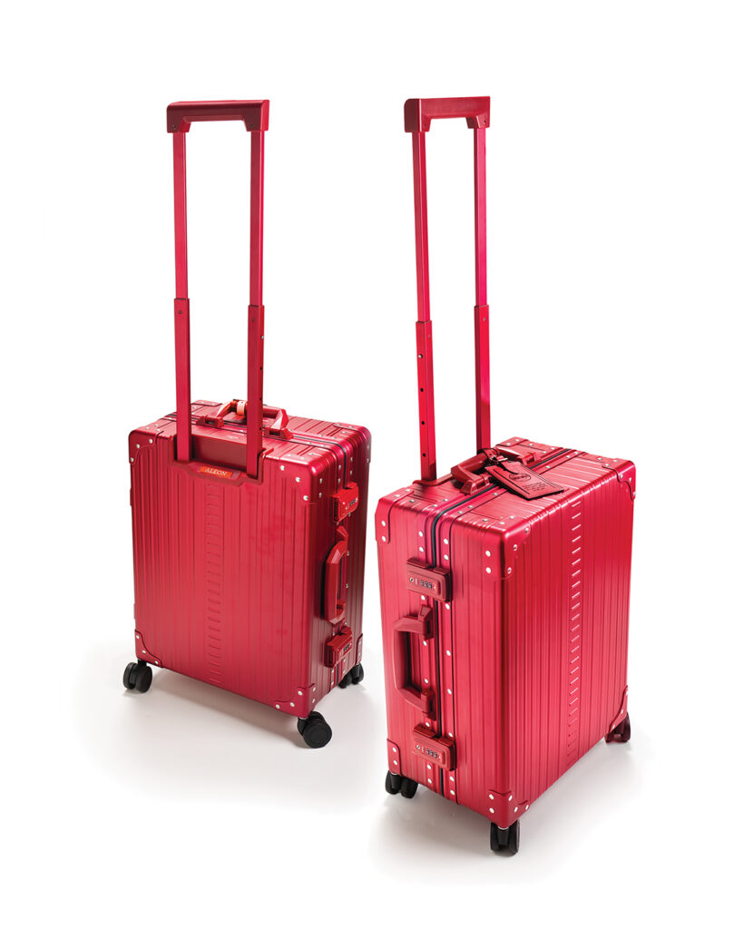 Never lose your luggage in a sea of black with shiny red carry-ons from Index Urban, an independent family-owned business in Encinitas and Hillcrest offering quality, upscale travel goods for the modern traveler