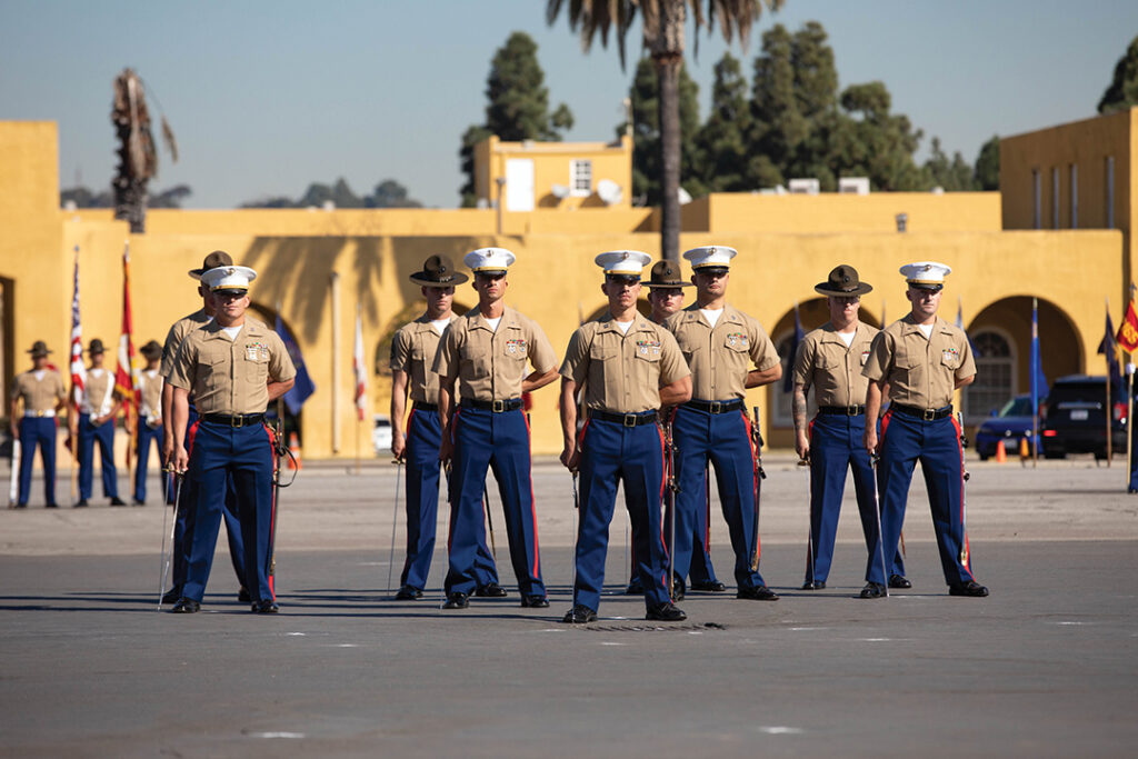 U.S. Marine Corps staff and drill instructors with Hotel Company, 2nd Recruit Training Battalion, stand in formation during a graduation ceremony at Marine Corps Recruit Depot San Diego on November 3, 2023. Graduation took place at the completion of the 13-week transformation, which included training for drill, marksmanship, basic combat skills, and Marine Corps customs and traditions
