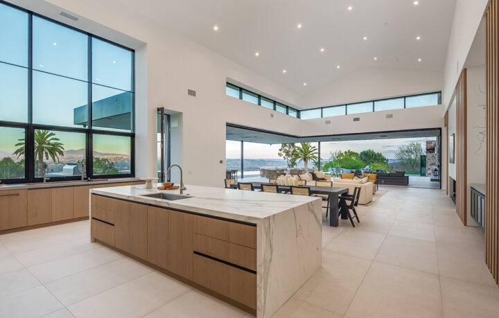 Expansive kitchens (three in all) feature Miele appliances, wood cabinets imported from Belgium, and countertops and flooring from the Tile Collective in Solana Beach