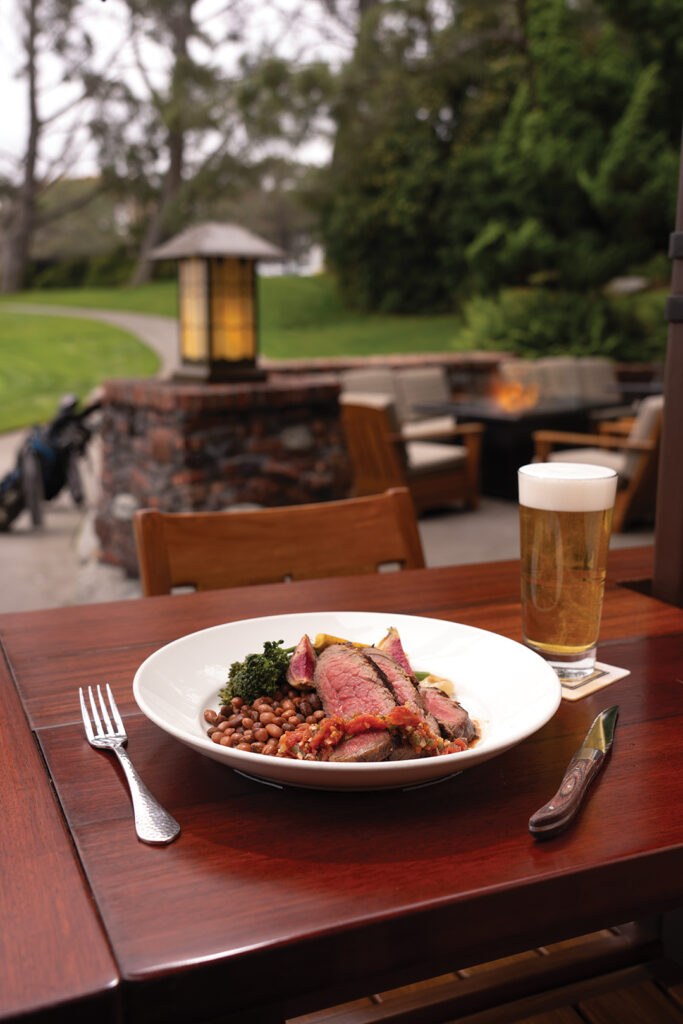 The Grill at Torrey Pines embraces the nostalgia of cooking over an open fire. Savor the smoky flavors in dishes from the restaurant’s custom-built wood-burning rotisserie and cozy up for a leisurely meal complete with sweeping views of the iconic Torrey Pines Golf Course. Try the Wood Grilled “Cardiff Crack” with Market Vegetables, Pinquito Beans, and Santa Maria Salsa Fresca (photographed here), 
a new menu addition by Chef Ryan Dzierzawski.