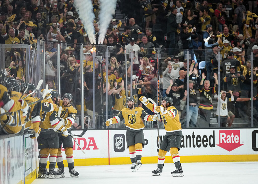 LAS VEGAS, NEVADA - JUNE 03: Shea Theodore #27 of the Vegas Golden Knights celebrates with teammates after scoring a goal during the second period against the Florida Panthers in Game One of the 2023 NHL Stanley Cup Final at T-Mobile Arena on June 03, 2023 in Las Vegas, Nevada. (Photo by Jeff Bottari/NHLI via Getty Images)