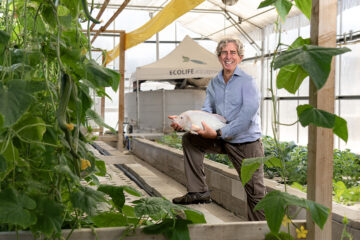 Bill Toone, founder and interim director of ECOLIFE Conservation, at the nonprofit’s Aquaponics Innovation Center in Escondido