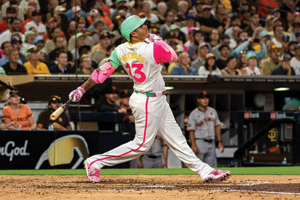 SAN DIEGO, CALIFORNIA - SEPTEMBER 6: Manny Machado #13 of the San Diego Padres hits an RBI single in the fifth inning during a game against the San Francisco Giants at Petco Park in San Diego, California Friday, September 6, 2024. (Photo by Armond Feffer/San Diego Padres)