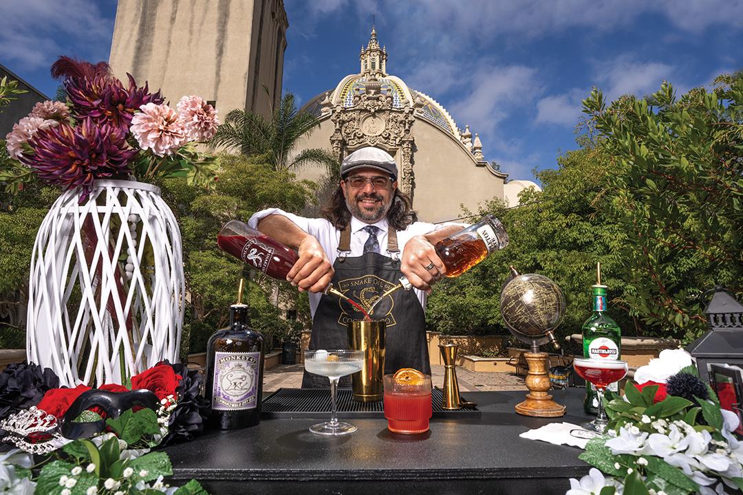 Snake Oil Cocktail Co. in front of the California Tower in San Diego's Balboa Park