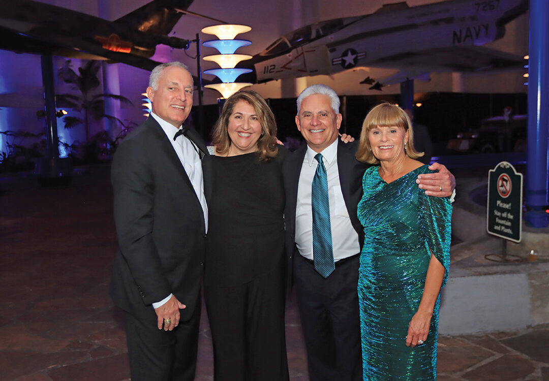 Alan and Jessica Hermann with Rear Admiral Michael Giorgione, CEC, USN (Ret.) and Michele Giorgione