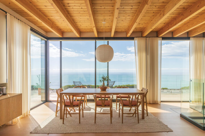 The architect’s dining room at SEA4 in Cardiff. “We always marvel at the nature on display; pelicans gliding by at eye level, surprise dolphin sightings and lots of surf action in the waves,” says Farrow