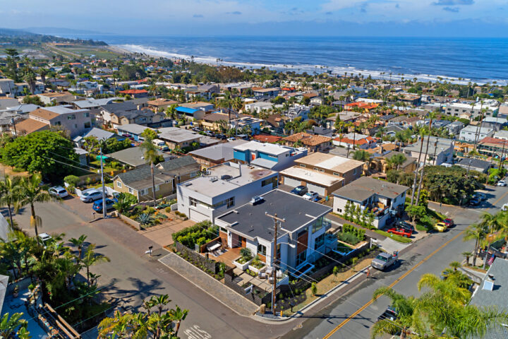 This $6,549,000 5-bedroom, 5-bathroom contemporary house on 367 Liverpool Drive is listed by Jam Zayer. It features panoramic ocean views, indoor-outdoor living, and a theater. “A–plus walkability, A-plus ocean views, and indoor-outdoor living. That’s what this new generation of buyers wants within 92007,” says Zayer