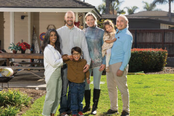 Darlene and Nick Abrams (left) and their children, Owen and Penny, with Charity Ball chair Micki Olin and husband Reid Abrams outside