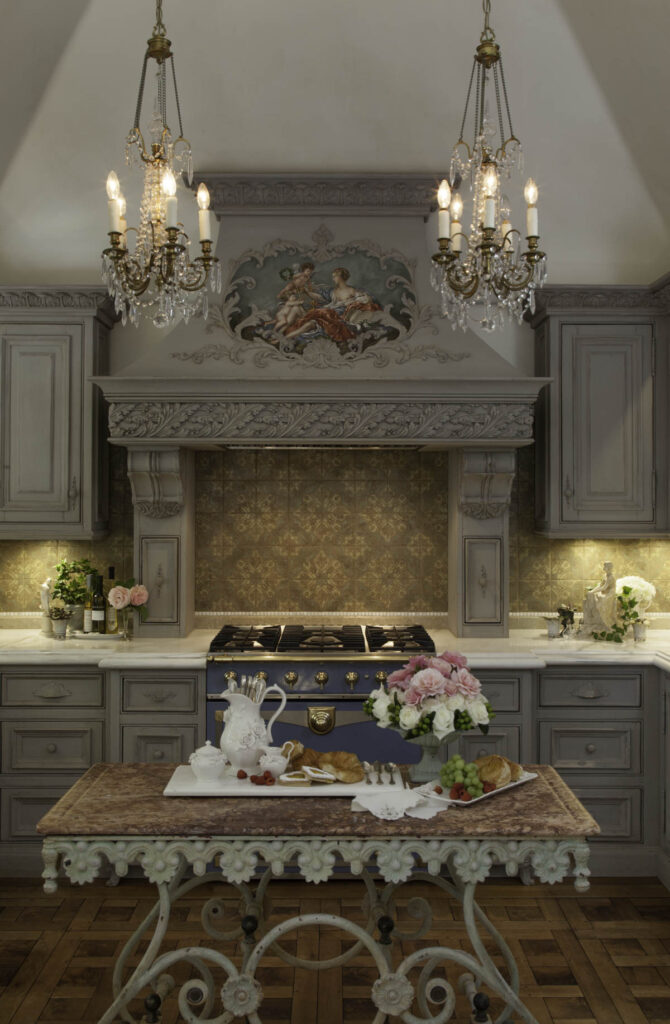 Let There be Light: Baumgart selected a pair of 17th century Louis XIV candelabras that were then cut, altered and wired to create the lighting over the antique French bakers table used as the island in the kitchen