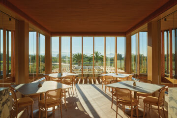 Sun streams through the Jewel Box tasting room which offers views of the valley and vineyards