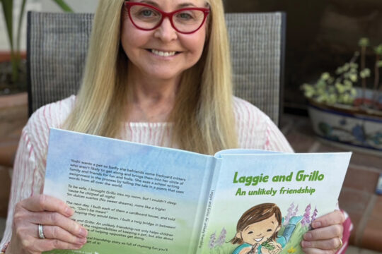 Phyllis Schwartz with her book