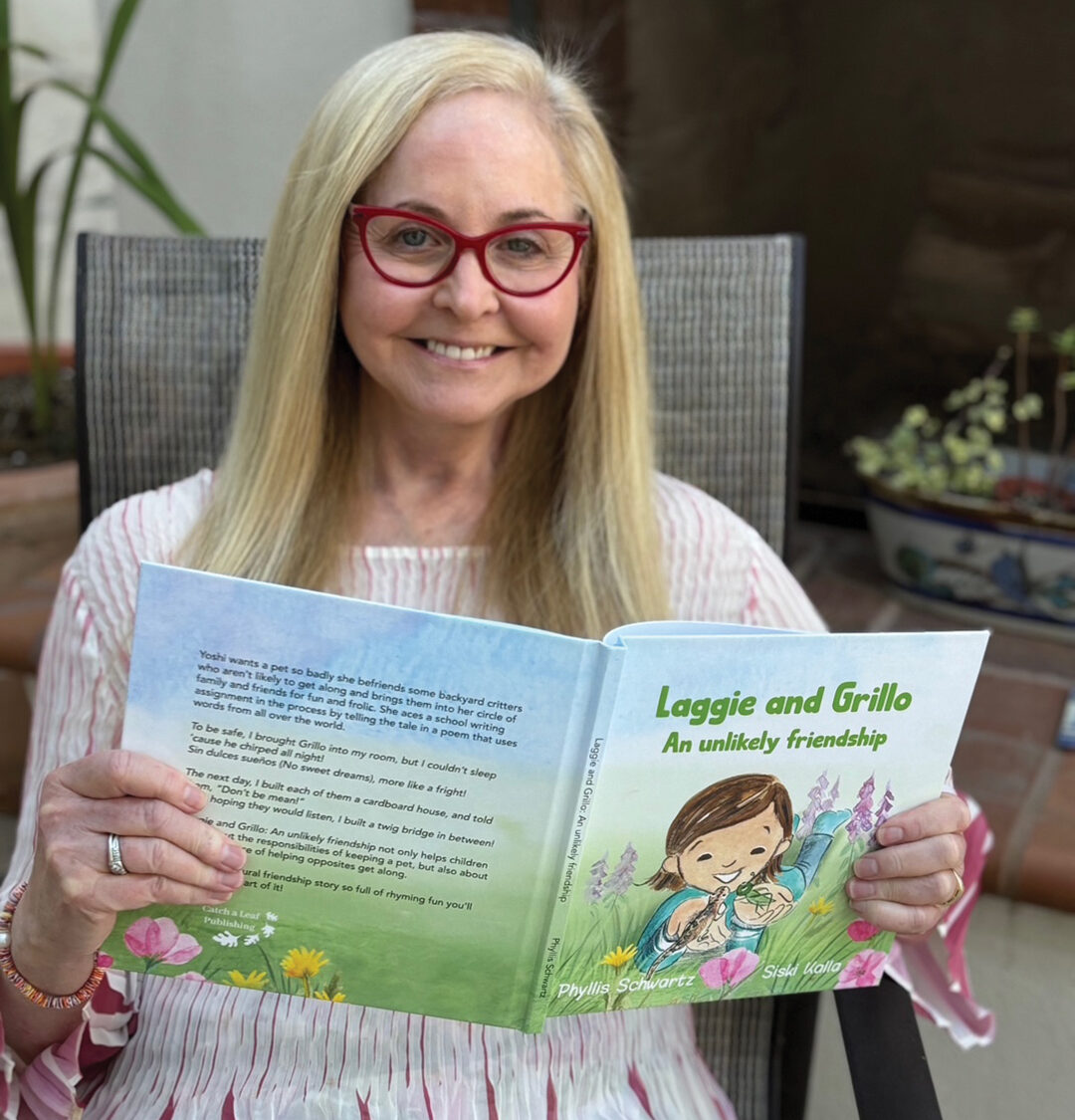 Phyllis Schwartz with her book