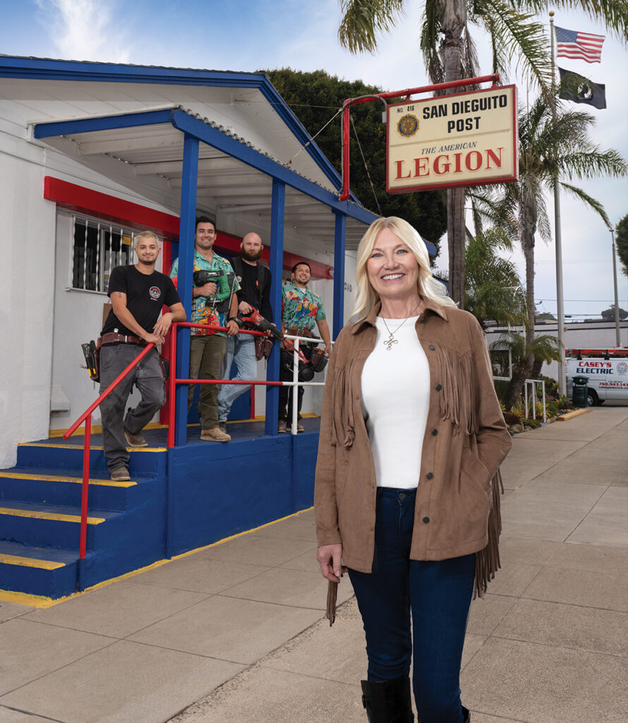 Valerie Griggs of Operation Restorations with the crew from Casey Electric at American Legion Post 416 in Encinitas