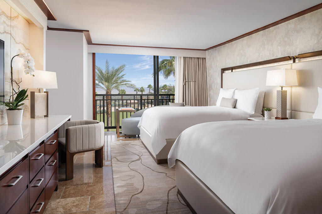 Enhanced guestrooms feature sleek furnishings, crisp Frette linens, and subtle accents of white, tan, gray, and chrome
