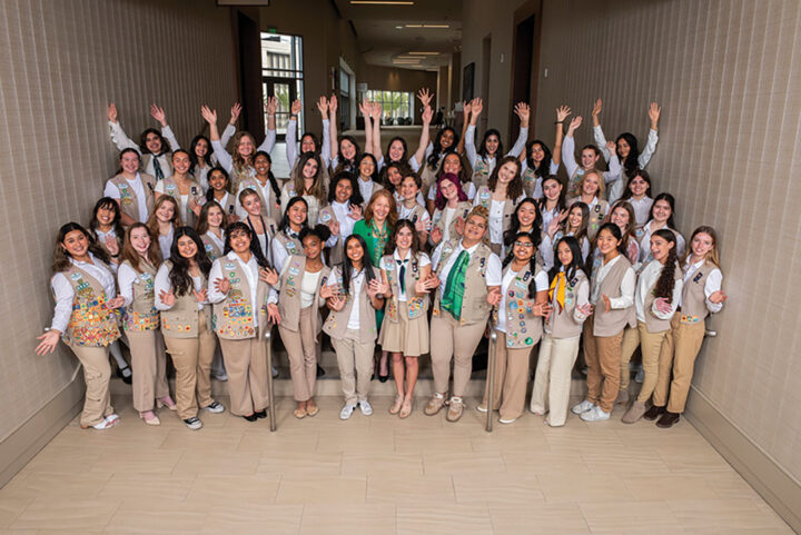 Emerging Leader Girl Scout class of 2025 with Girl Scouts San Diego CEO Carol Dedrich (center, in green)