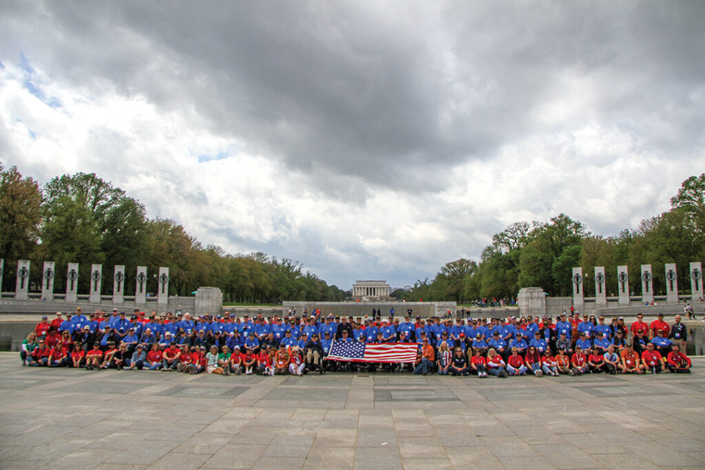 The veterans and their battle buddies gathered at the World World II Memorial on the National Mall