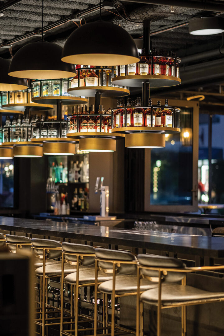 Rare Society evokes a 1920s vibe with its dark interiors and gold accents