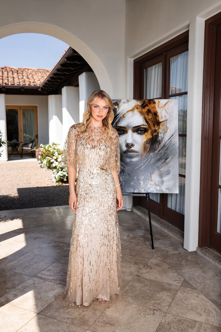 Dress, Monique Lhuillier, South Coast Plaza. Round diamond bracelet totaling 27 carats, John Matty Co.; Painting, Fractured Light, Unbroken Soul by Jay Johansen