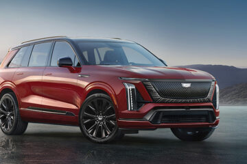 Front 3/4 view of the 2026 Cadillac VISTIQ Platinum trim in Radiant Red