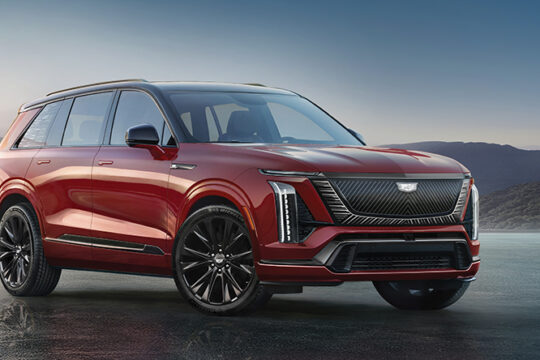 Front 3/4 view of the 2026 Cadillac VISTIQ Platinum trim in Radiant Red