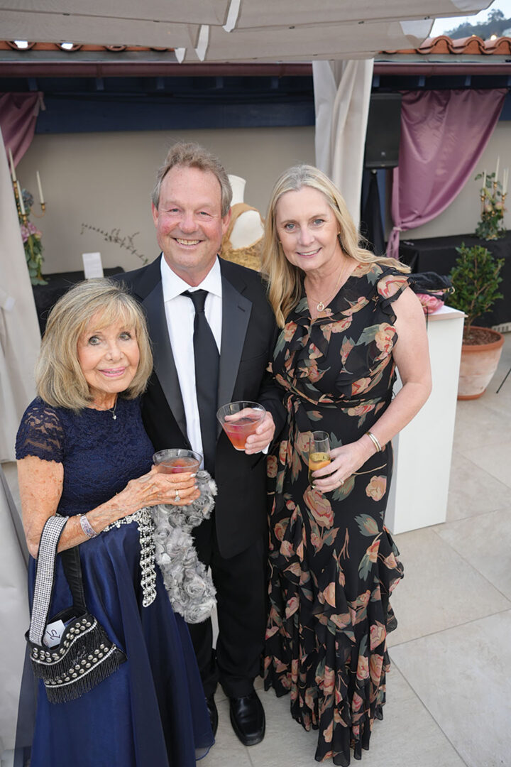 Barbara Kjos with Mark and Kelly Kjos