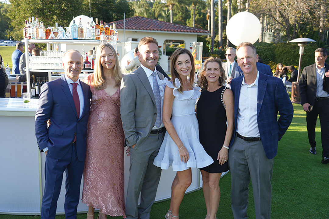 Justin and Jamie Gover, Dick and Kristi Pfister, and Michelle and Chris Riley