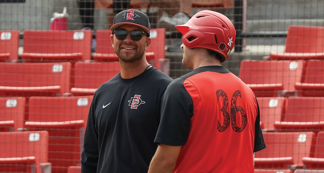 Aztecs Head Baseball Coach Kevin Vance with player Zach Justice